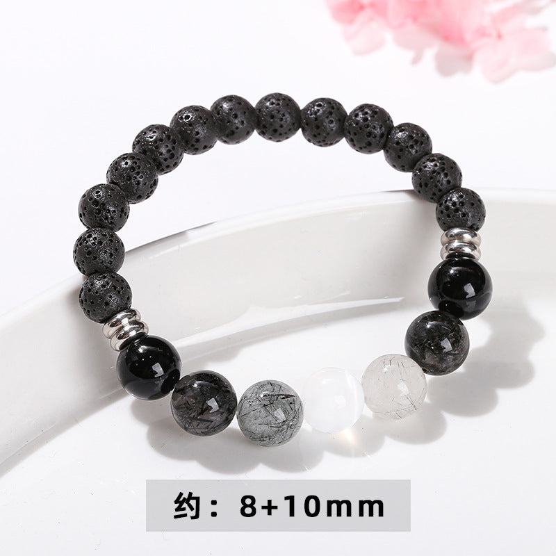 Natural volcanic stone and black hair crystal bracelet.