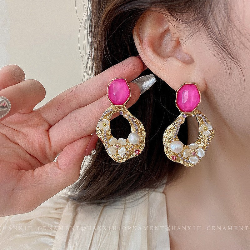 Flower pearl pleated hollow earrings,