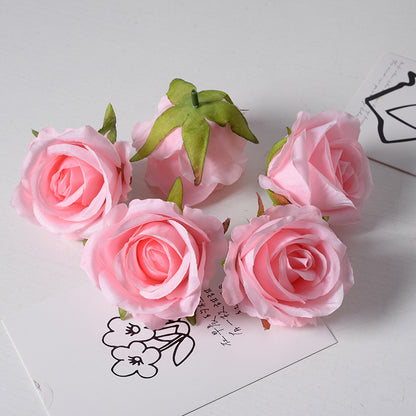 Artificial rose flower head