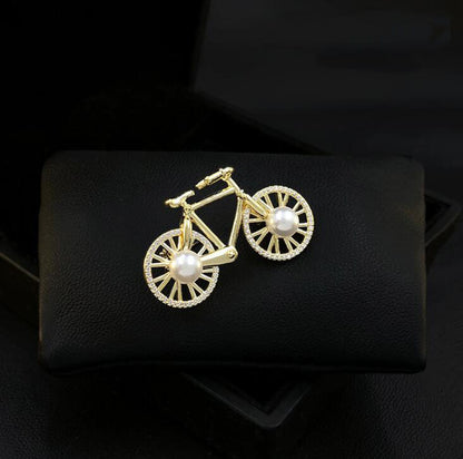 Cartoon bicycle brooch