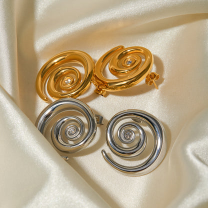 Swirl design diamond earrings