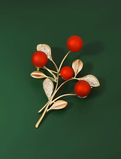 Red festive brooch