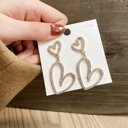 Long diamond hollow heart earrings