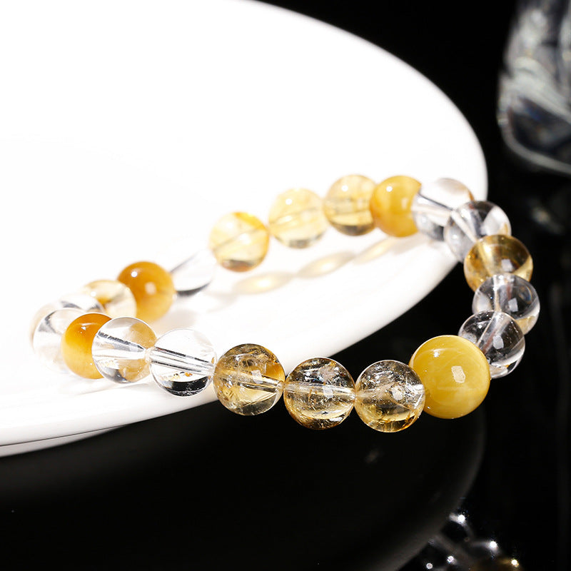 Natural citrine and white crystal and yellow tiger's eye bracelet.