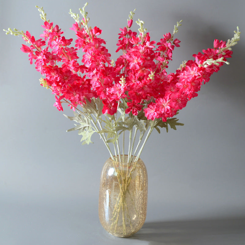 Artificial rose red and orange flowers