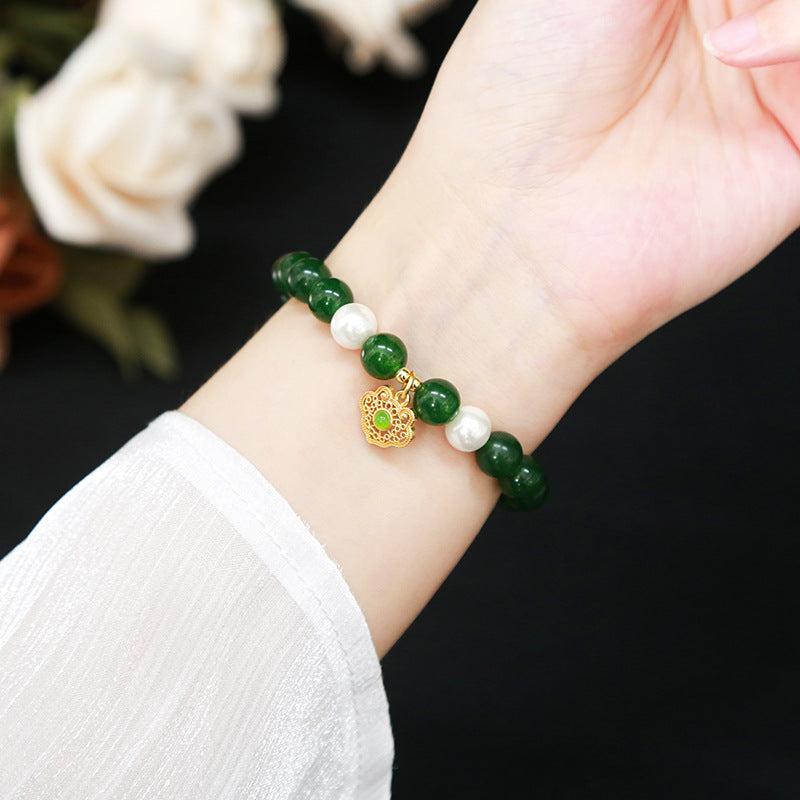 Imitation Hetian jade round bead bracelet.