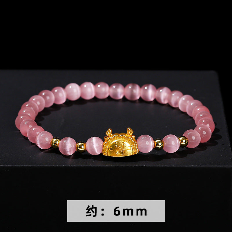 Pink and white cat's eye stone dragon steamed dumpling bracelet.