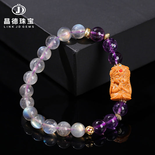 Gray moonstone and amethyst sandalwood Tara bracelet.