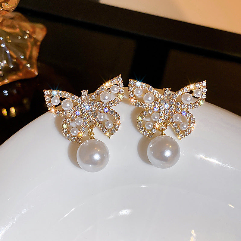 Diamond pearl butterfly pendant earrings