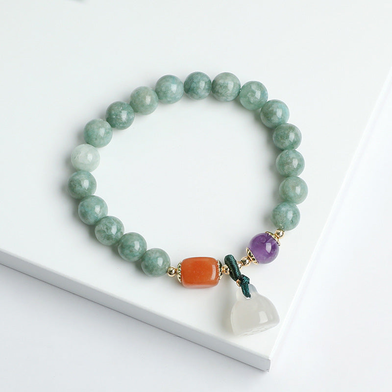 Blue chalcedony bracelet, white jade pumpkin bead pendant.