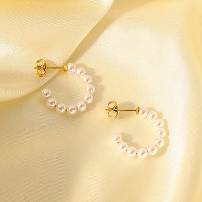 Pearl C-shaped earrings