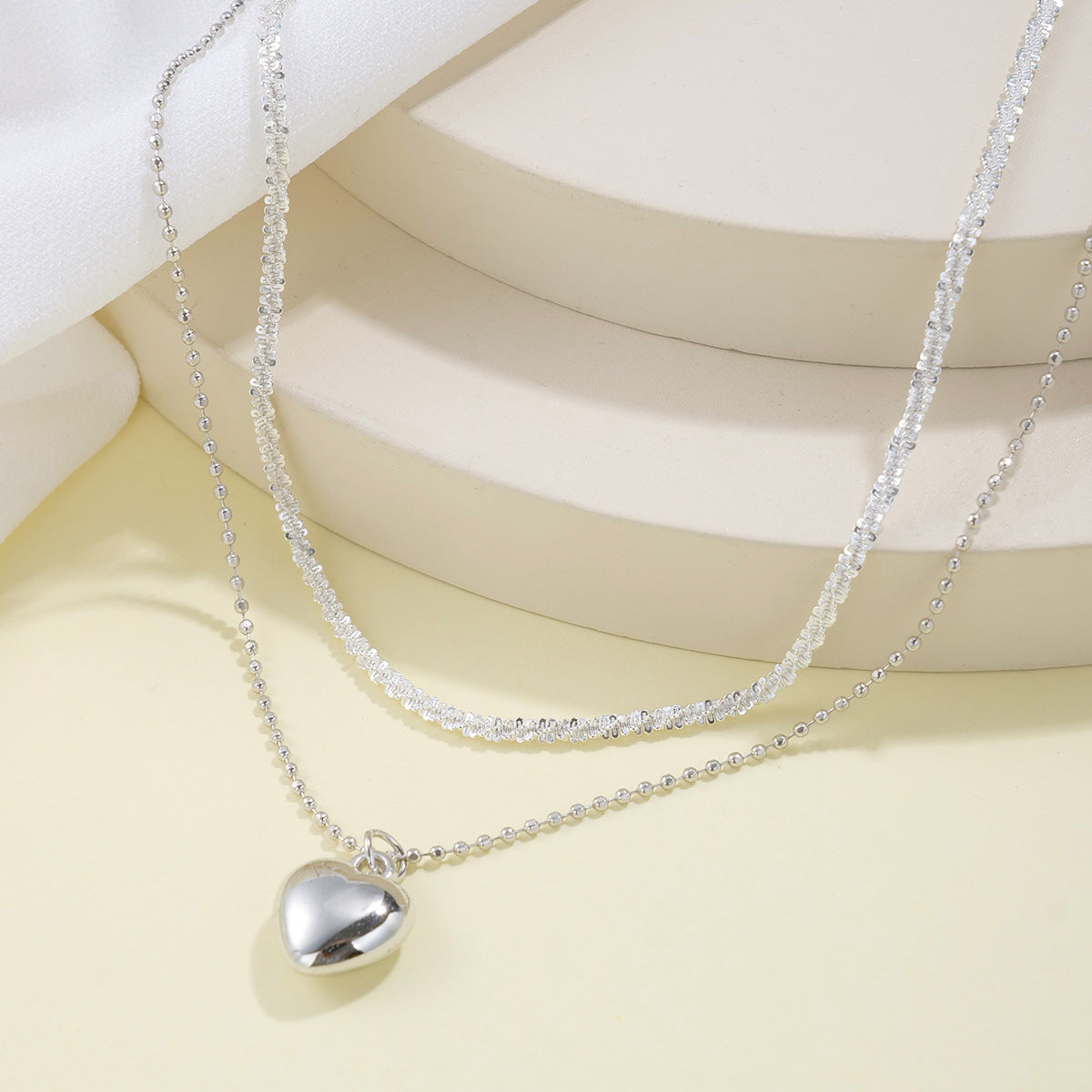 Double layered heart necklace