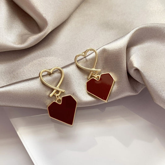 Love drip earrings niche