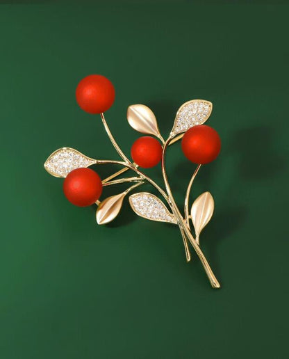 Red festive brooch