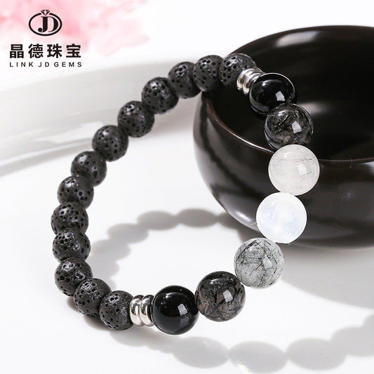 Natural volcanic stone and black hair crystal bracelet.