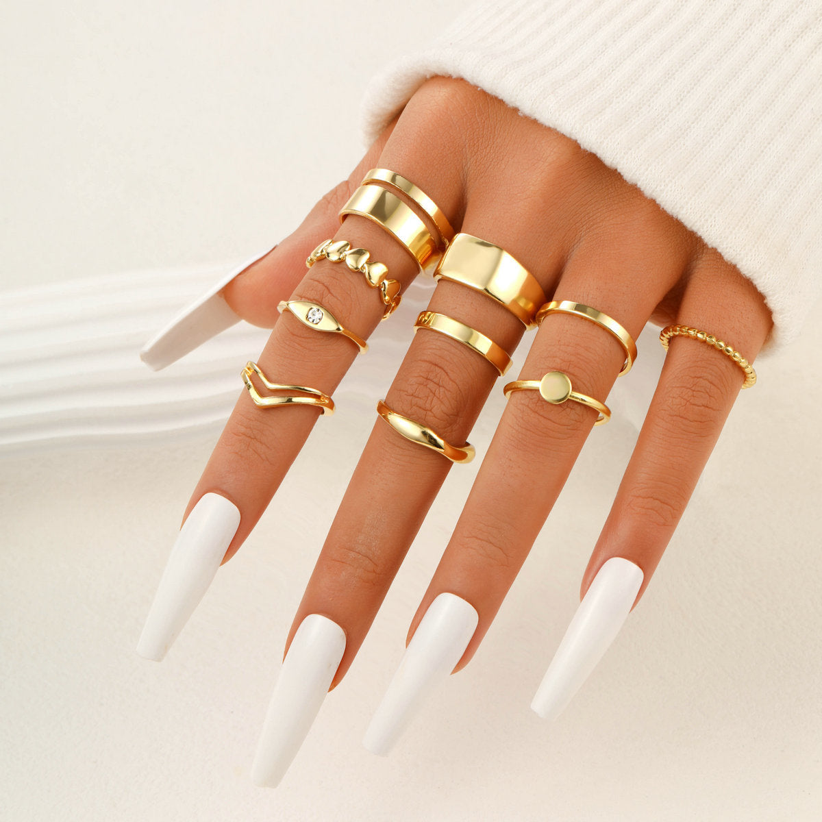 Set of 11 women's wave geometric rings