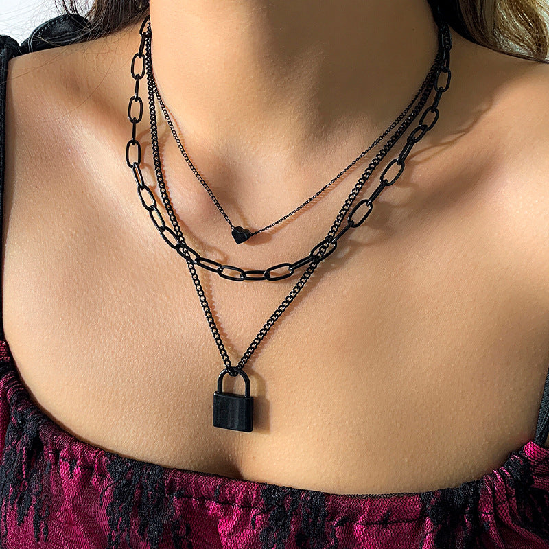 Black cross chain stacked with love necklace