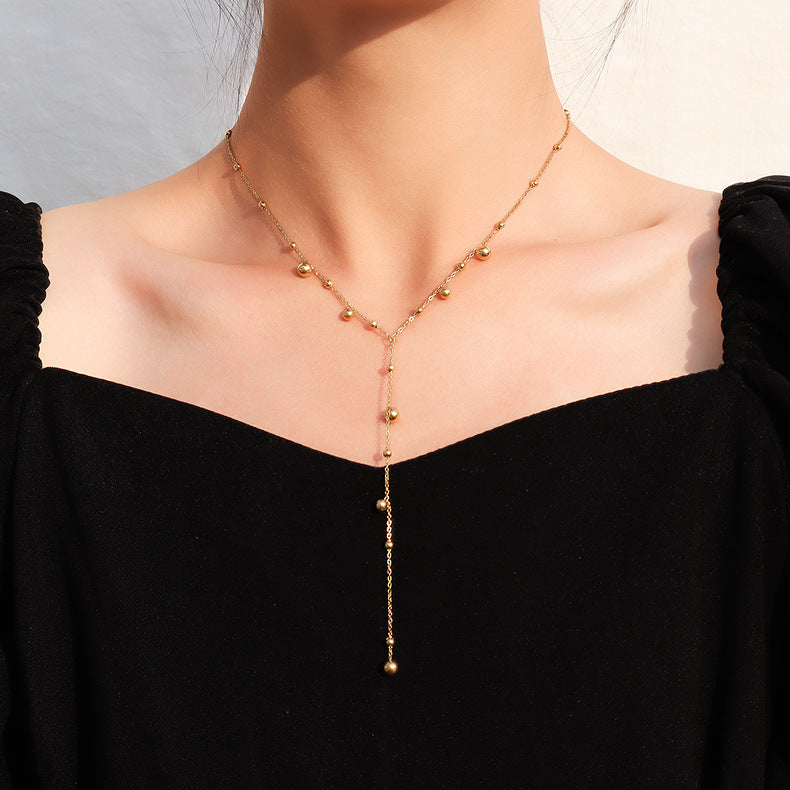 Gold multi-pendant fringed necklace