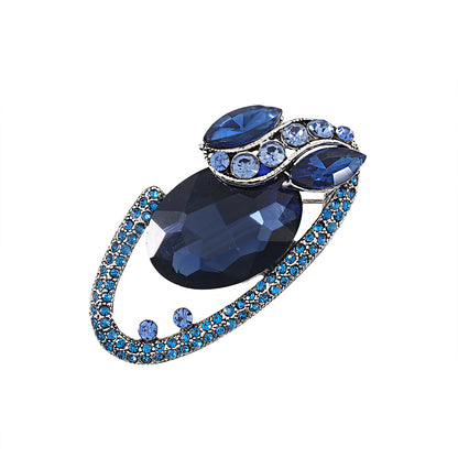 Crystal glass inlaid earth brooch