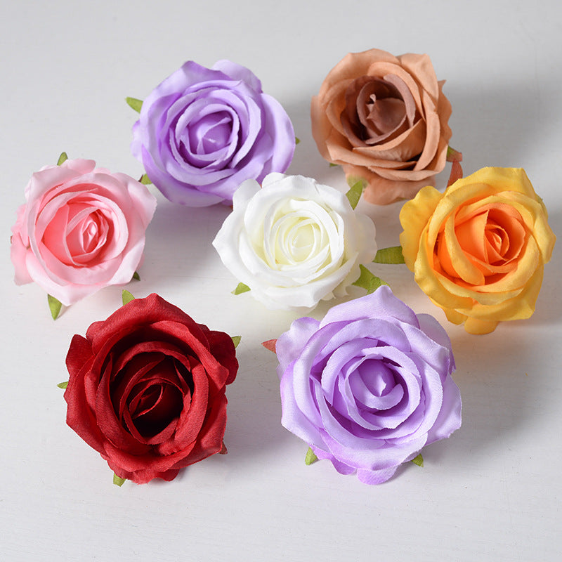 Artificial rose flower head