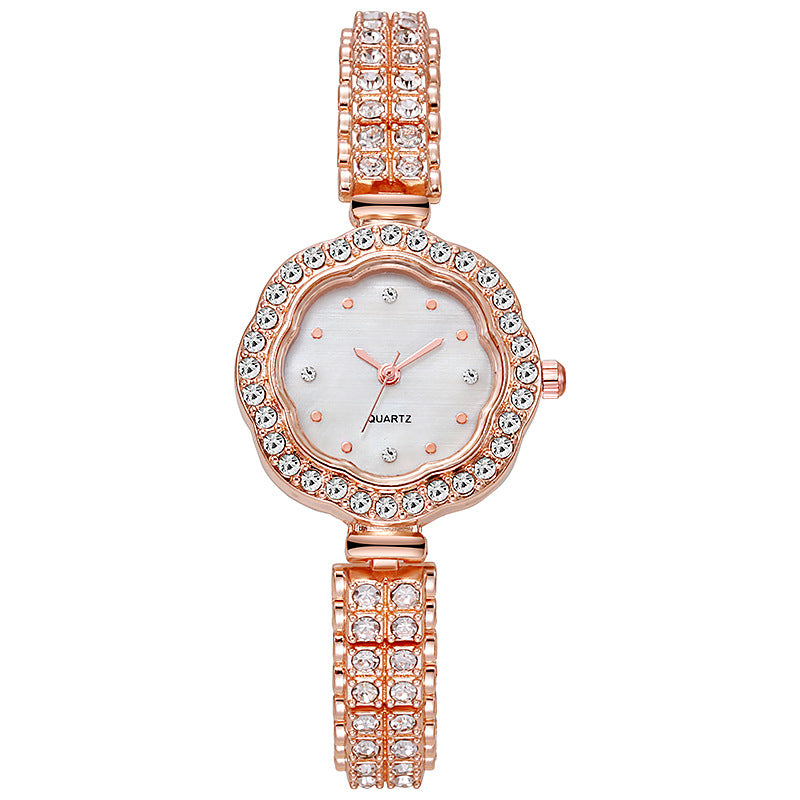 Reloj de mujer con diamantes de imitación y flores 