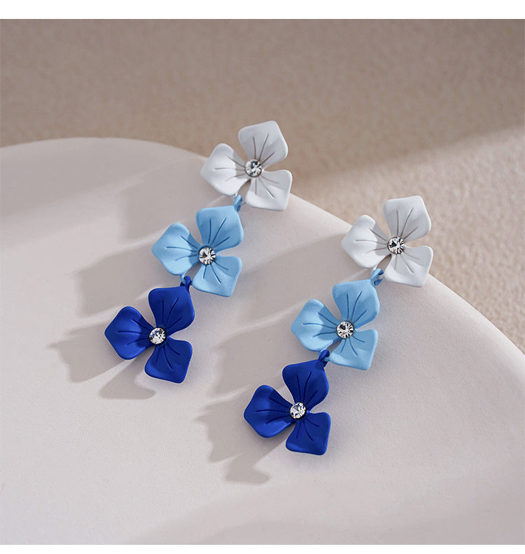 Klein blue stud earrings gradually change flowers