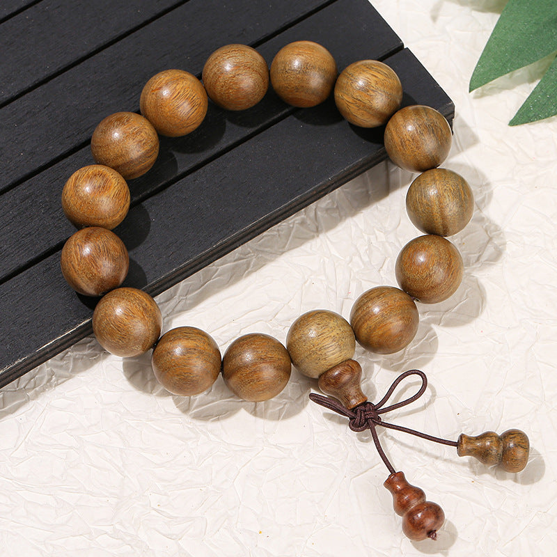 Green sandalwood bead bracelet.