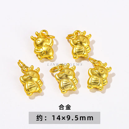 Ancient sand gold dragon year small accessories alloy