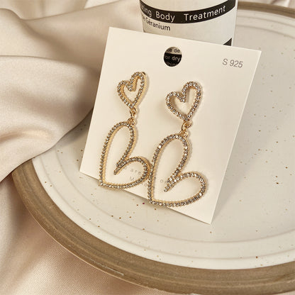 Long diamond hollow heart earrings