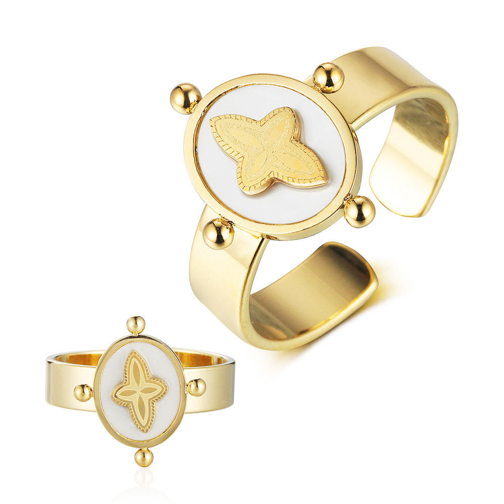 Anillo de acero de titanio con forma de corazón de melocotón y estrella goteante 