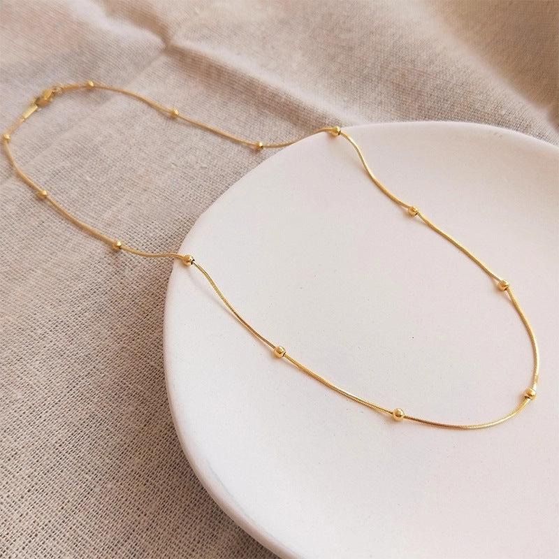 18K gold round bead necklace