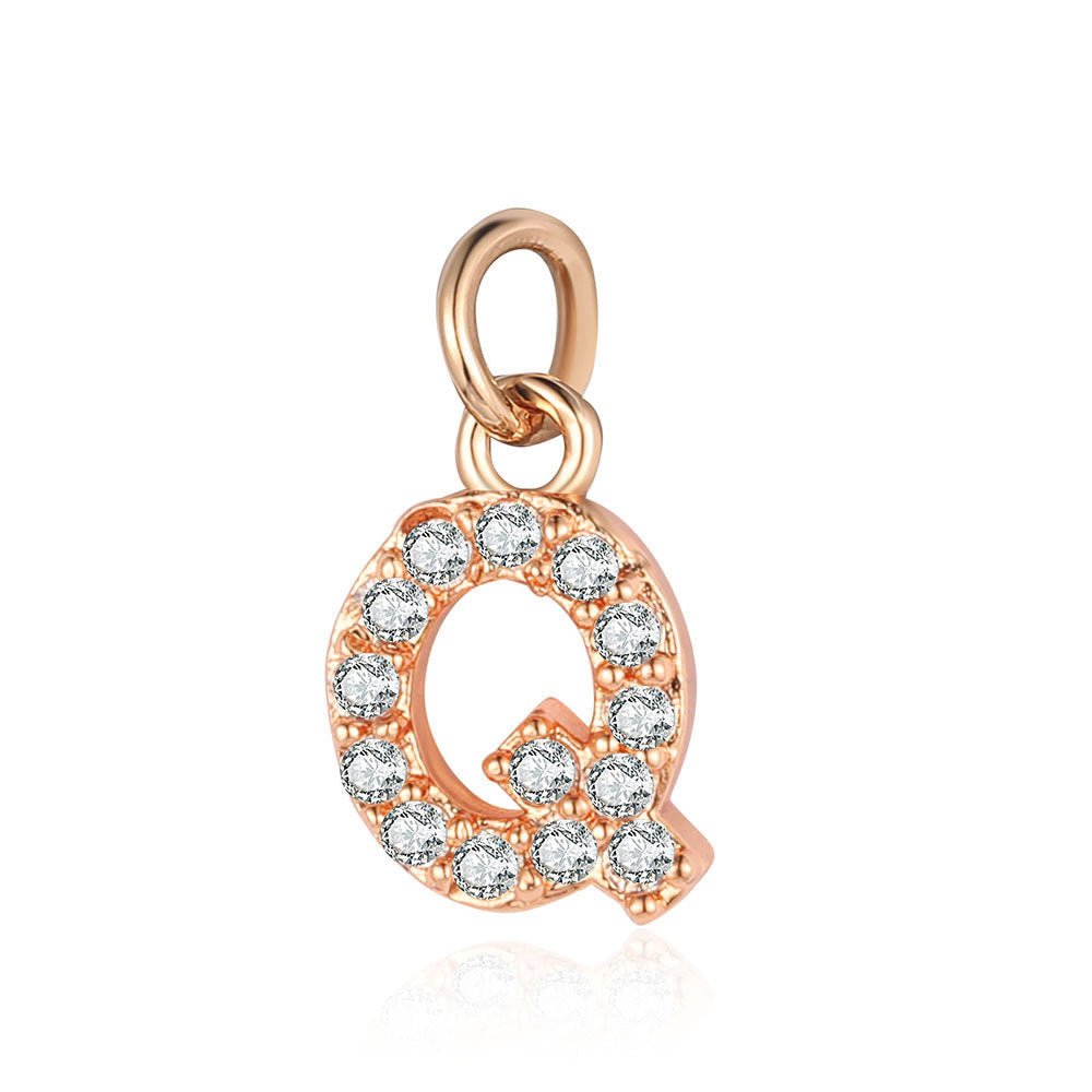 26 rose gold English letter copper zircon pendants.