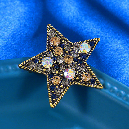 Pentagram brooch with diamonds