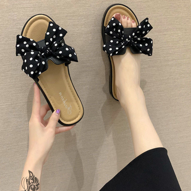 Polka dot flower flip flops