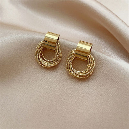 Hollow circle multi-layer winding stud earrings