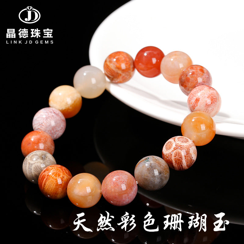 Colored coral jade round bead bracelet.