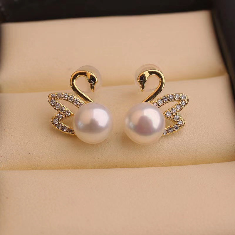 Design sense hollow swan imitation pearl stud earrings