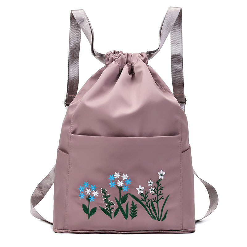 Foldable embroidered travel bag