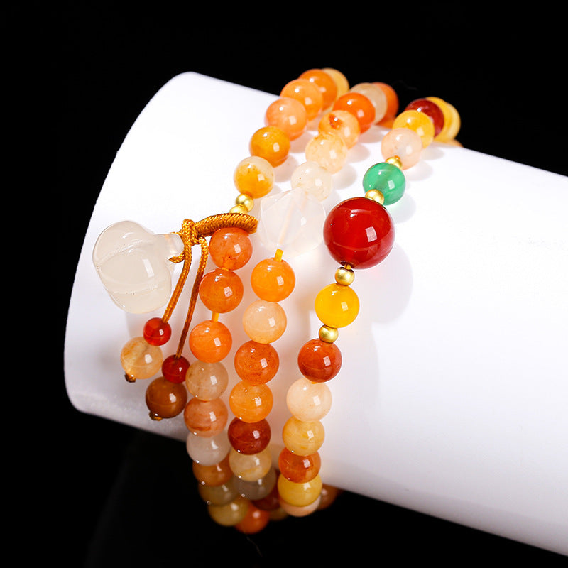 Golden silk jade multi-ring bracelet