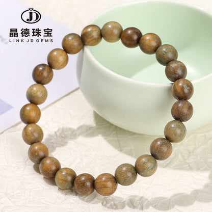 Green sandalwood bead bracelet.