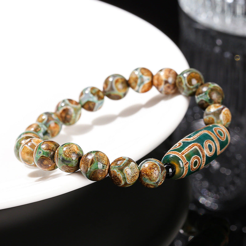 Green nine-eyed dzi bead bucket bead bracelet