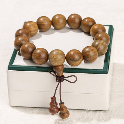 Green sandalwood bead bracelet.