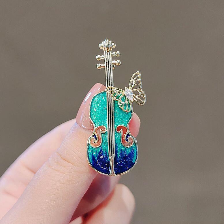 Blue violin brooch