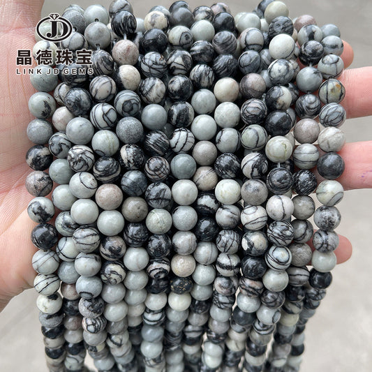 Natural black and white grid stone loose bead wood grain stone