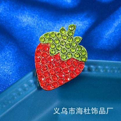 Simple red strawberry brooch with diamonds