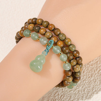 Pulsera de sándalo verde Colgante de calabaza de jade Dongling verde 