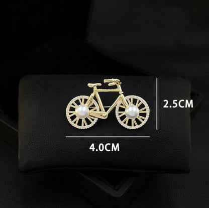 Cartoon bicycle brooch