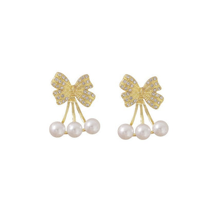 Niche bow pearl earrings