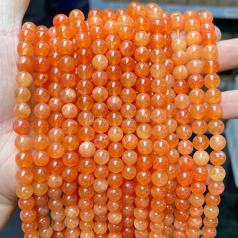 Perlas sueltas de calcedonia naranja optimizada de Xinjiang 