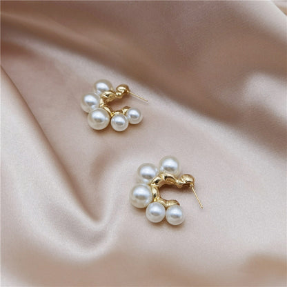 Vintage C-shaped large pearl stud earrings